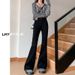 2025 New Guangzhou Xintang Washed Blue Micro Flare Jeans For Women, High Waist, Slimming, Height-Enhancing, Cotton_mkmklike.com