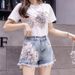 Women's clothing white t-shirt for women + heavy industry embroidered denim skirt suit wholesale hip skirt two-piece set_mkmklike.com