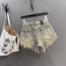 2026 New Retro Old Ripped Holes Heavy Industry Fringed Rough Edge A-word Super Shorts Spice Girl Hip-wrapped Single-breasted Denim Shorts_mkmklike.com
