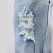 Fashionable Washed Jeans For Men With Torn Holes_mkmklike.com