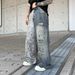 Men's Retro Patchwork Washed Denim Jeans - Loose Straight Fit With Leopard Print & Distressed Details_mkmklike.com