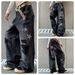 Unisex Straight-Leg Distressed Jeans – Vintage-Inspired Star Patched Denim With Relaxed Fit & Raw Hem_mkmklike.com