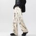 European And American High Street Wide-leg Pants Leopard Print Jeans Male Ruffian Handsome Fried Street American Loose Casual Pants_mkmklike.com